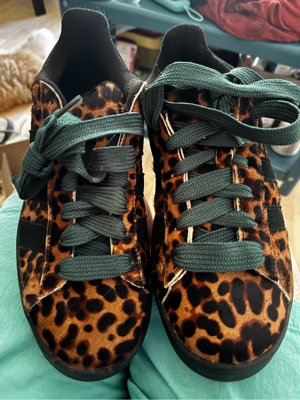 Adidas Leopard Print Sneakers with Teal Laces.  Sized men’s 8.5/Women’s 9.5